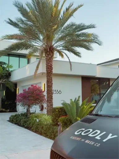 professional window cleaning team member